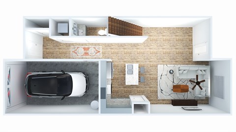 A top-down view of a car in a garage attached to a house.